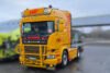 Gelber Scania Super Sattelzugmaschine der EAR GmbH mit Schwertransport-Kennzeichnung für Entsorgung und Recycling